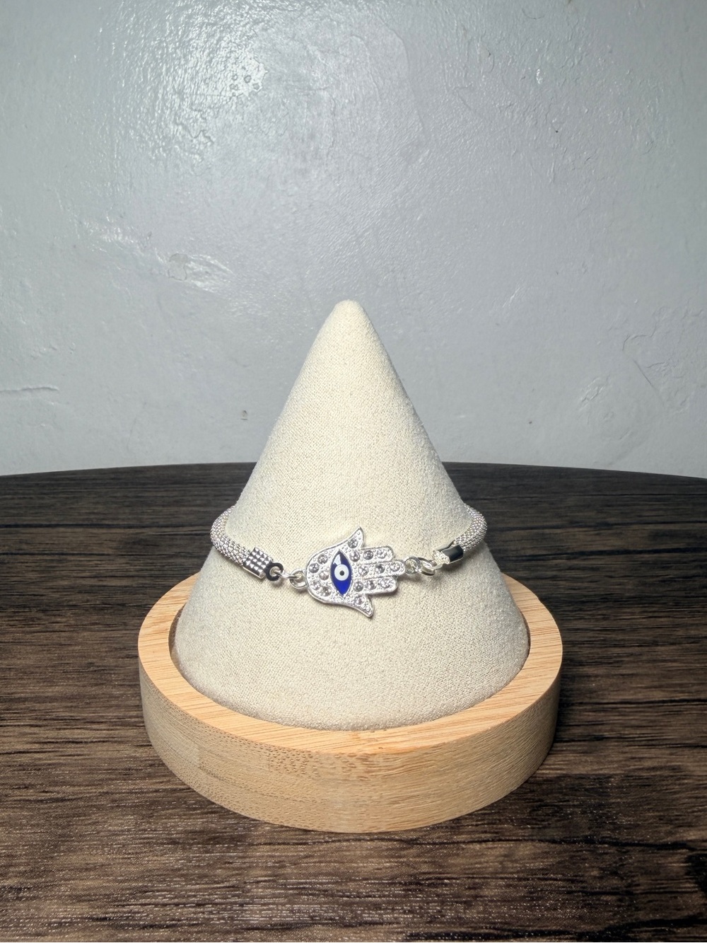 Silver Hamsa Hand Bracelet with Blue Evil Eye Accent
